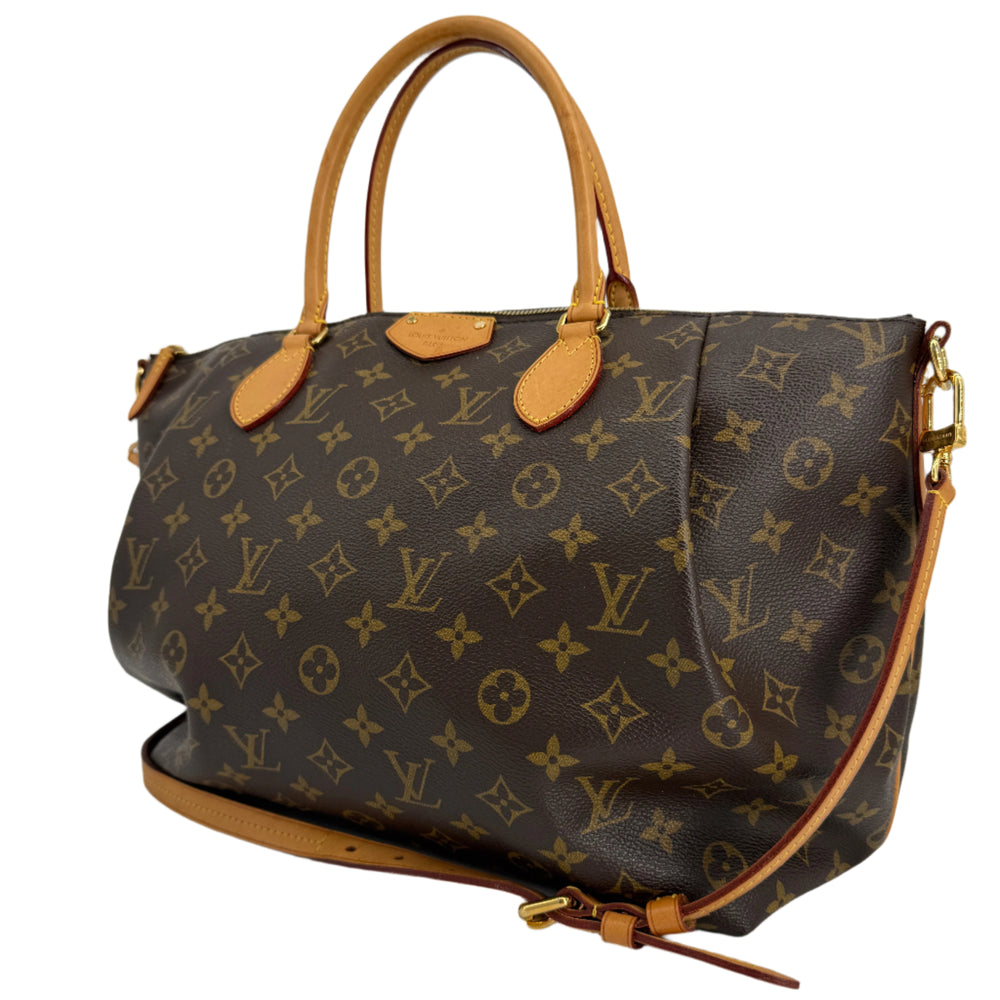Louis Vuitton Monogram Turenne MM handbag with top handles and crossbody strap, featuring polished pleating.
