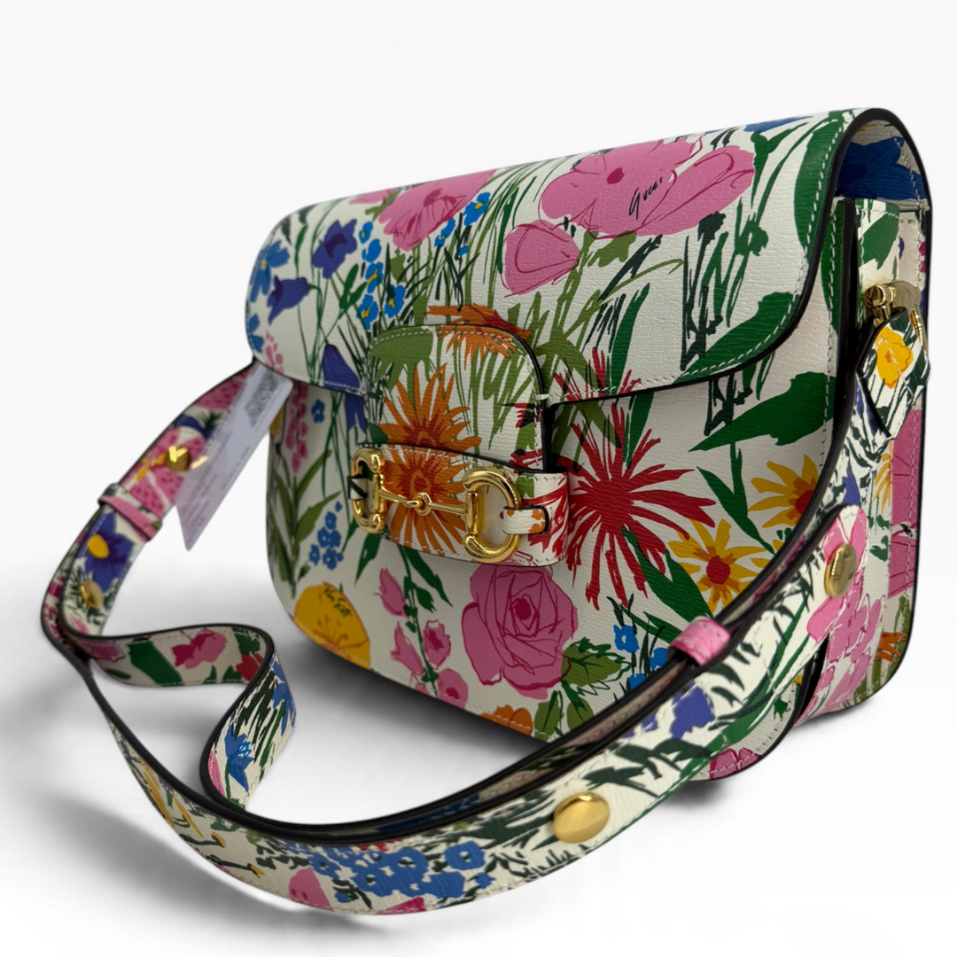 Gucci x Ken Scott Horsebit 1955 floral shoulder bag right three-quarter view with adjustable matching printed shoulder strap