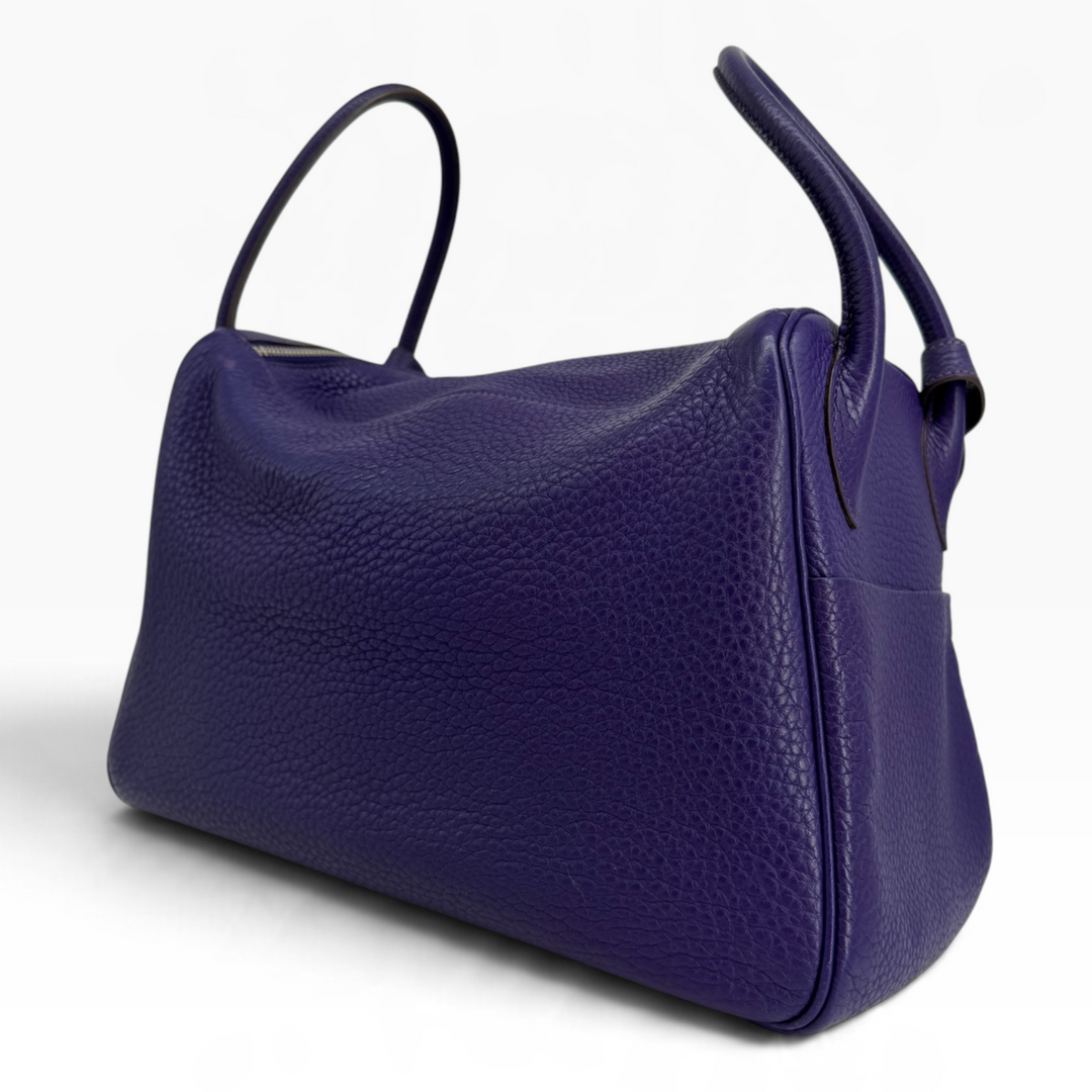 Hermès Lindy 26 Iris purple Clemence leather rear angled view showing soft grained leather and side pocket