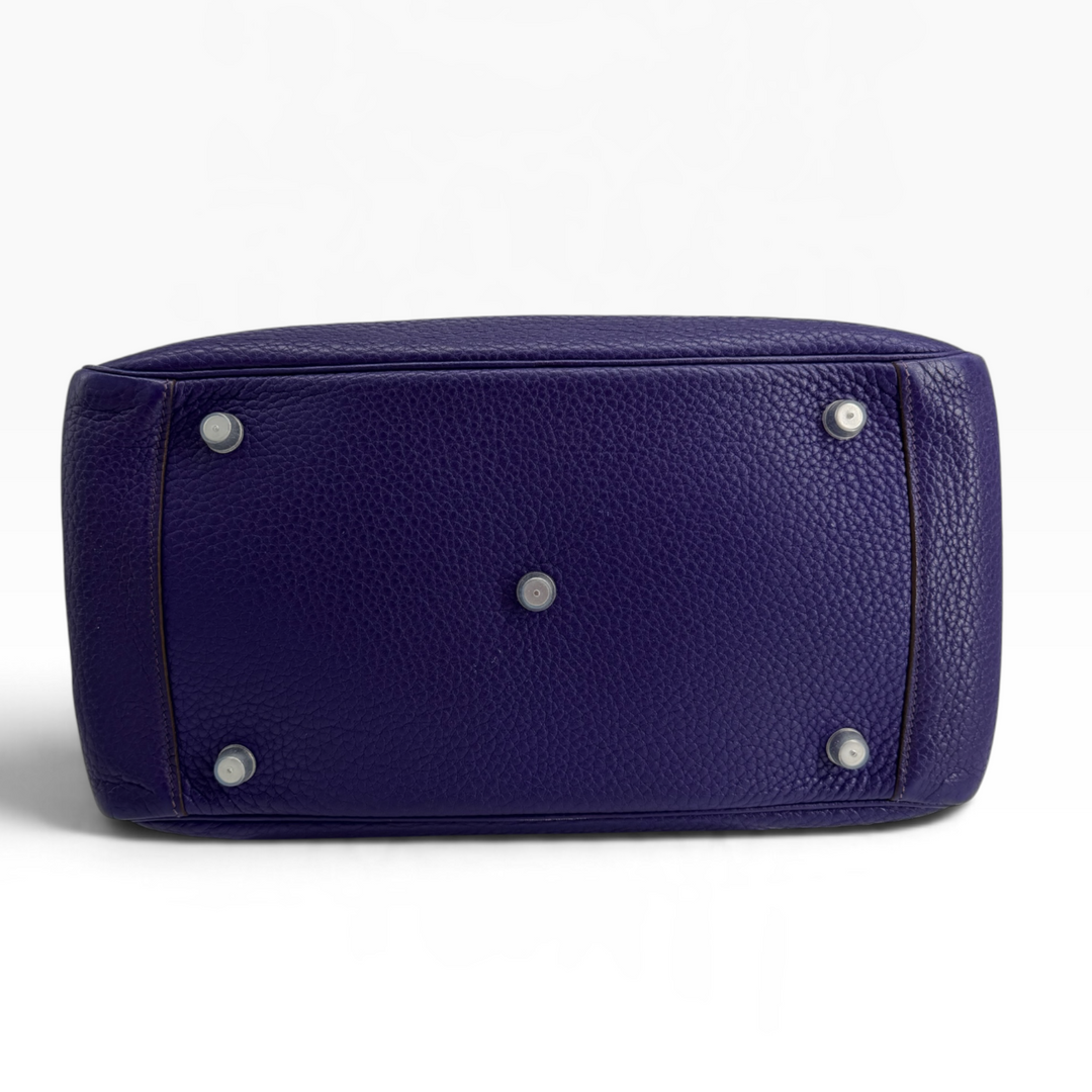 Hermès Lindy 26 Iris purple Clemence leather base showing five palladium-tone protective feet