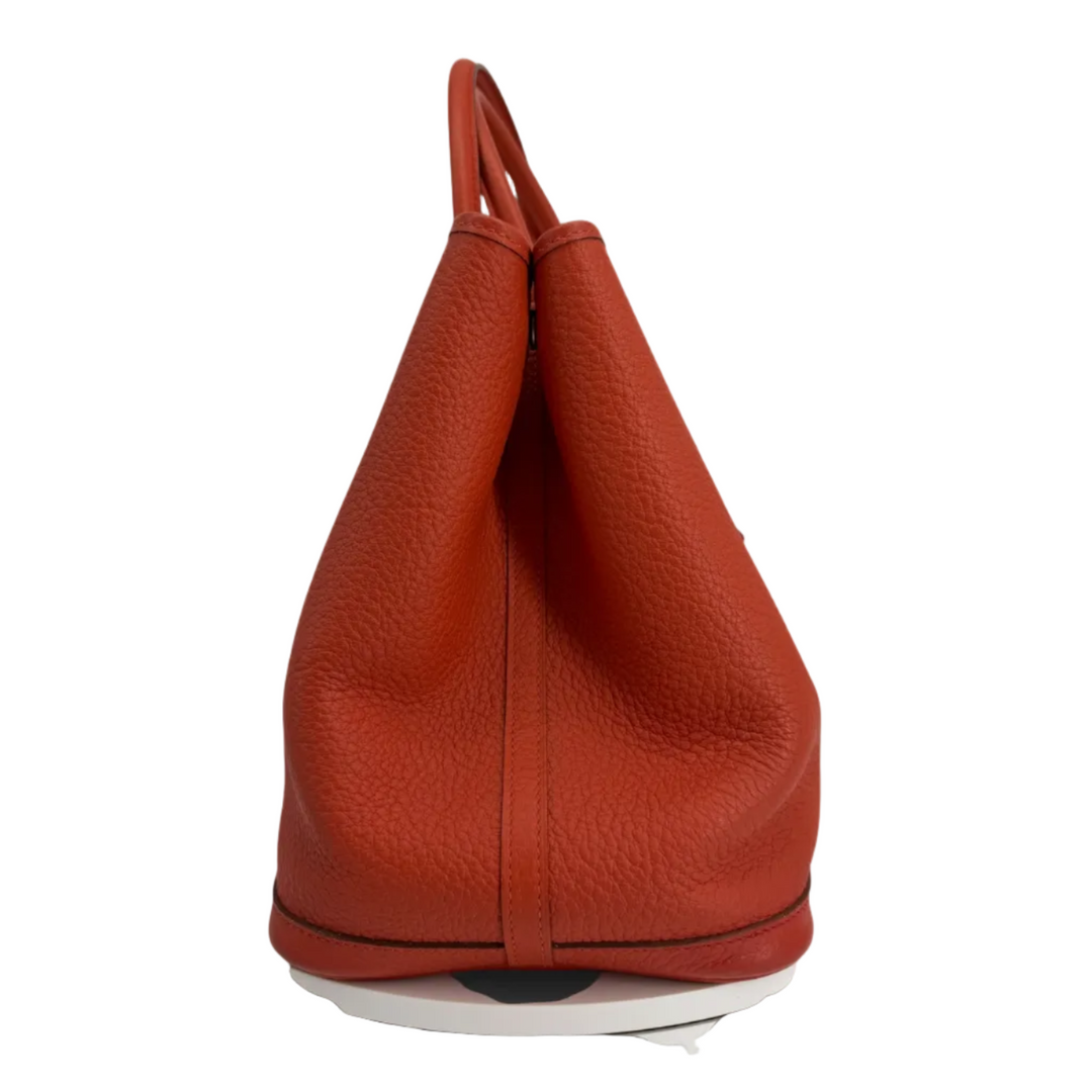 Hermès Garden Party 30 Orange Poppy opposite side profile with pebbled leather and central side seam