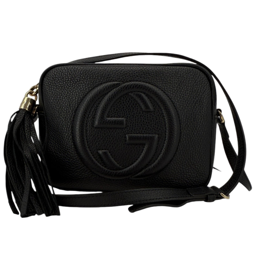 Gucci Soho Disco Small Crossbody bag in black pebbled calfskin leather with tassel and interlocking G logo.