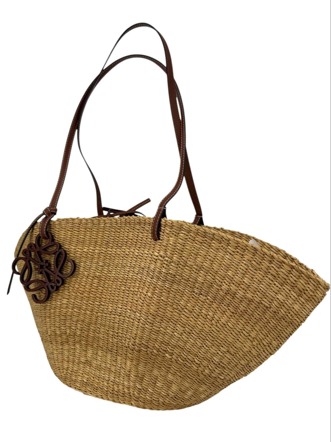 Loewe Raffia Basket Tote in Brown & Natural Tan | LuxLoveLouis showcasing a sculptural design and leather accents.