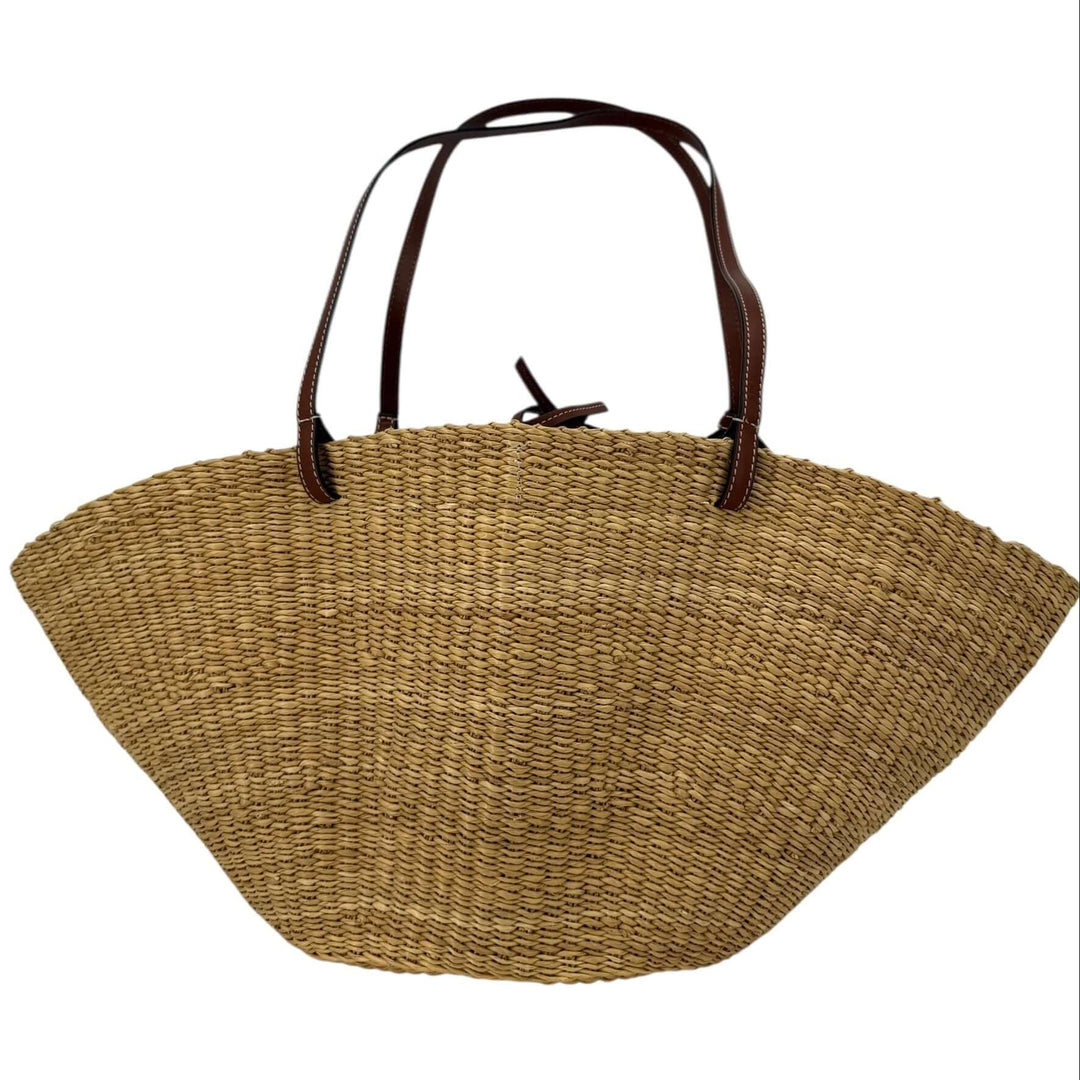 Loewe Raffia Basket Tote in Brown & Natural Tan | LuxLoveLouis, handcrafted tote showcasing natural raffia and leather accents.