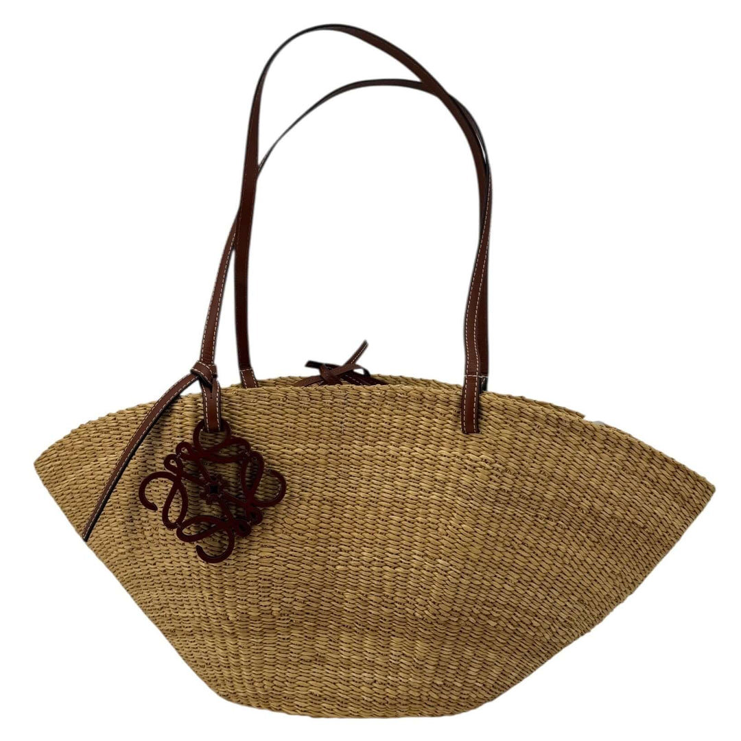 Loewe Raffia Basket Tote in Brown & Natural Tan | LuxLoveLouis showcasing elegant craftsmanship and artisanal details.