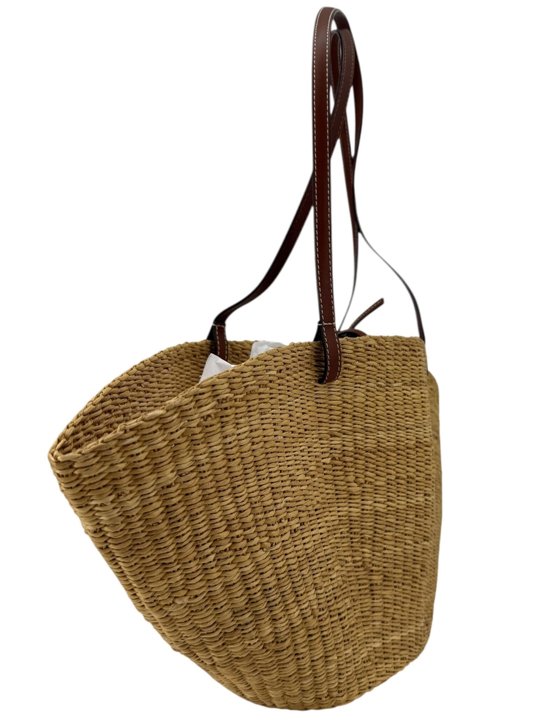 Loewe Raffia Basket Tote in Brown & Natural Tan | LuxLoveLouis, showcasing a handcrafted raffia design and leather straps.