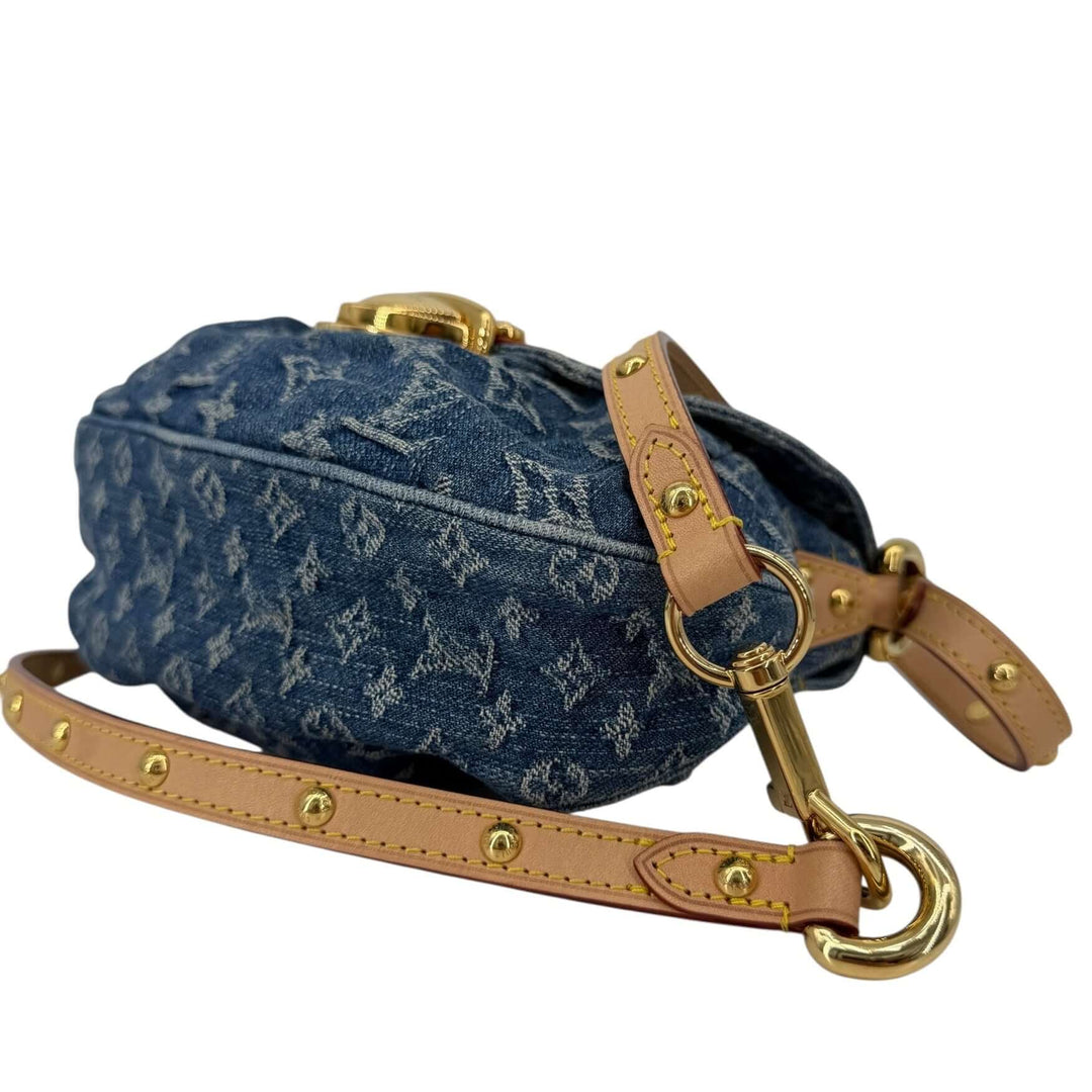 Louis Vuitton Monogram Denim Sunset Blue Bag | LuxLoveLouis side view, showcasing denim texture and studded strap.