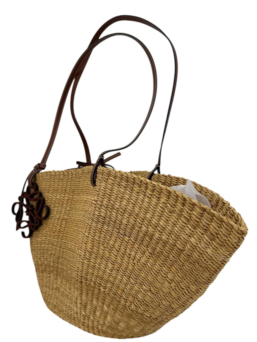 Loewe Raffia Basket Tote in Brown & Natural Tan | LuxLoveLouis showcasing its handcrafted design and leather accents.