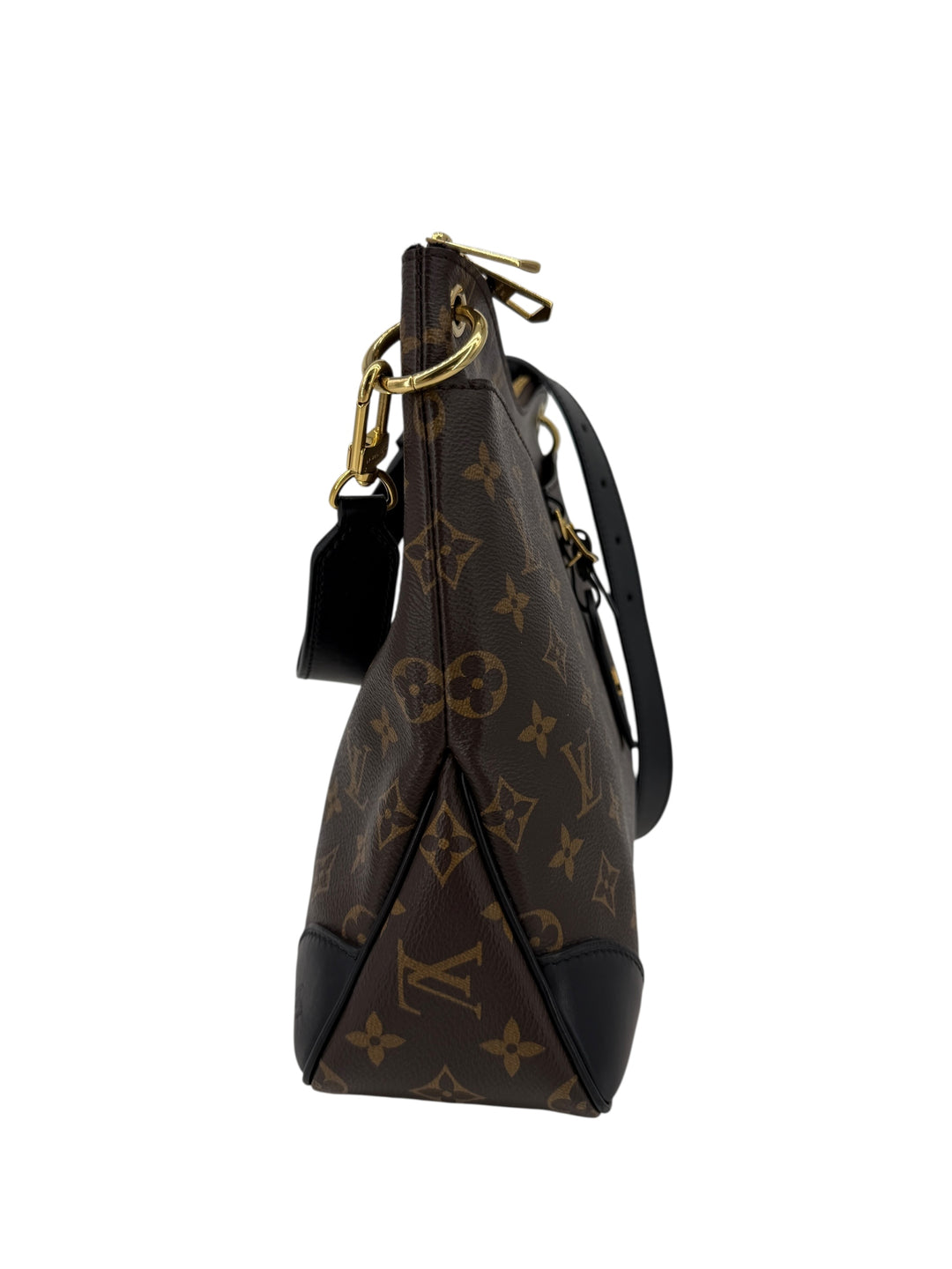 Side view of Louis Vuitton Monogram Odeon MM bag featuring black leather trim and adjustable strap.