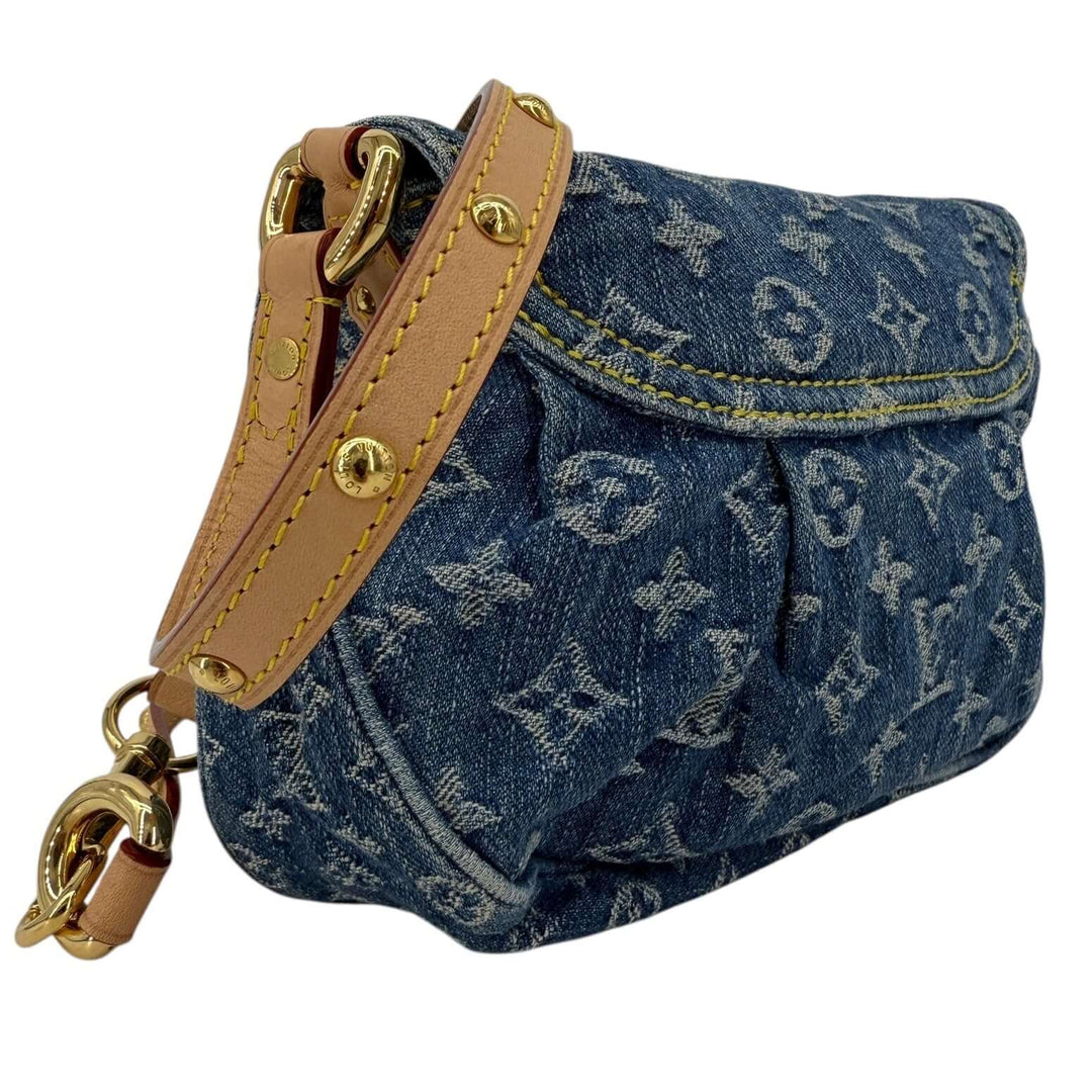Louis Vuitton Monogram Denim Sunset Blue Bag | LuxLoveLouis with elegant detailing and a studded leather strap.