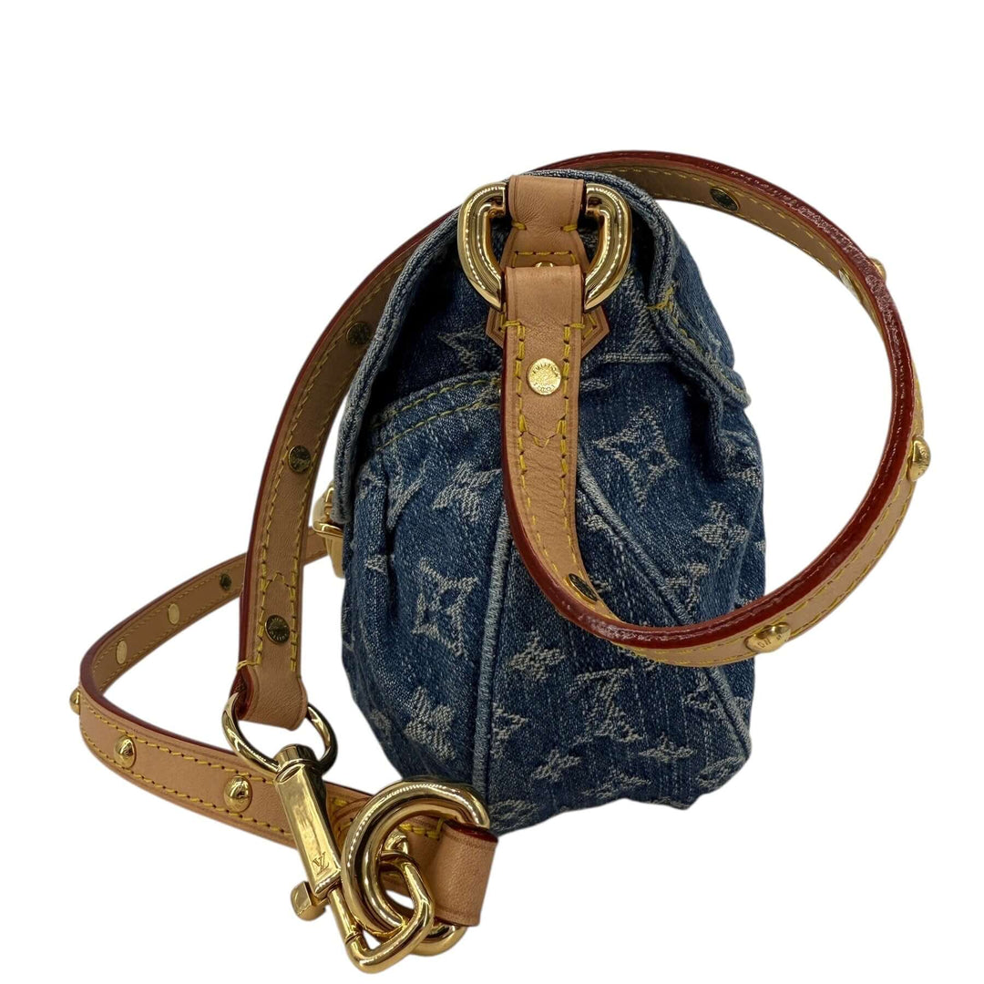 Louis Vuitton Monogram Denim Sunset Blue Bag | LuxLoveLouis with a studded leather strap and denim texture.
