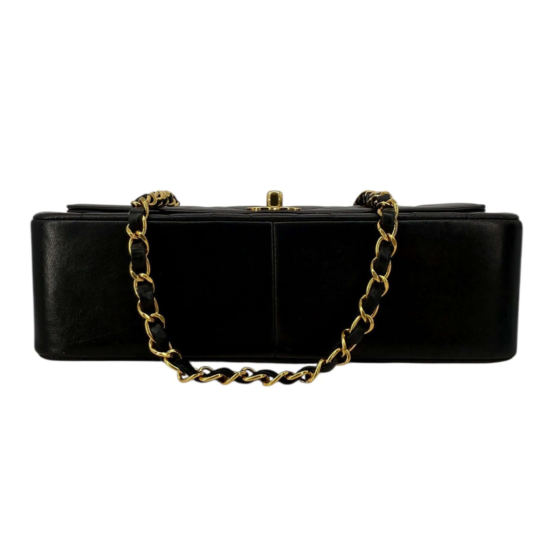 Chanel Diana 22 Small Black Lambskin Shoulder Bag | LuxLoveLouis shown from the back with gold chain strap.