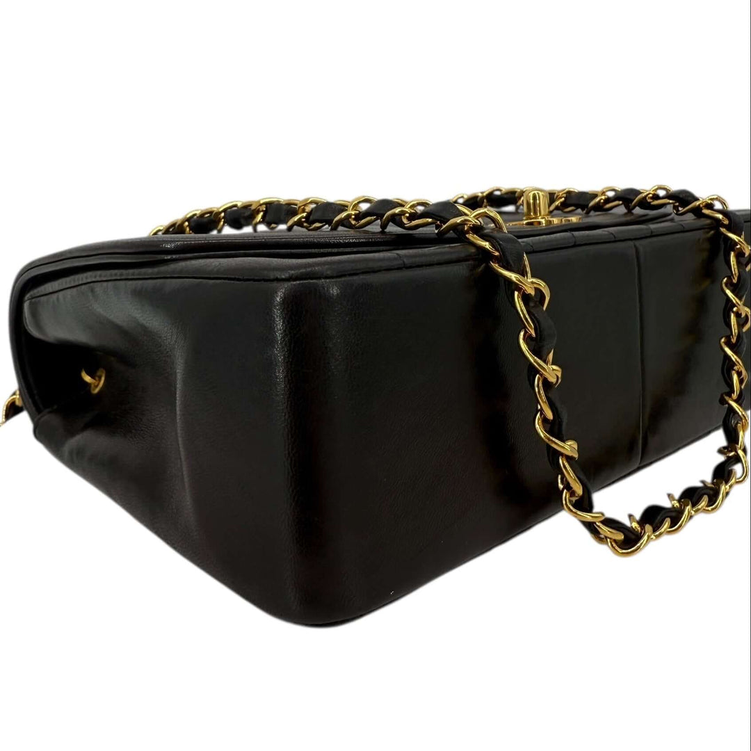 Chanel Diana 22 Small Black Lambskin Shoulder Bag | LuxLoveLouis showcasing its elegant structure and signature gold chain.