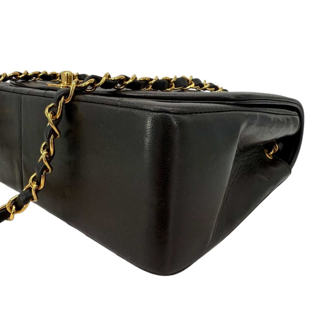 Chanel Diana 22 Small Black Lambskin Shoulder Bag | LuxLoveLouis showcasing its luxurious lambskin and gold chain.