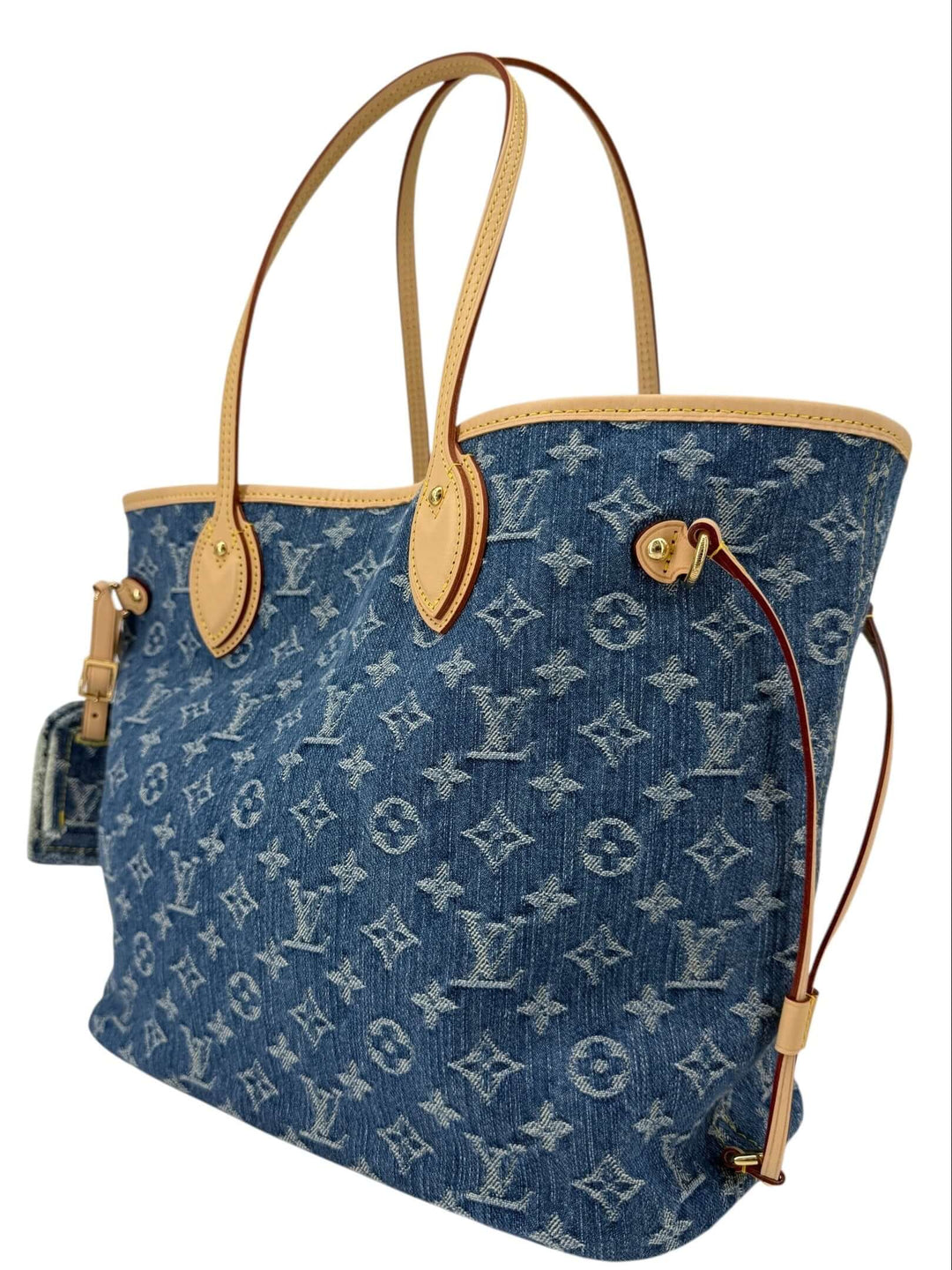 Louis Vuitton Neverfull MM Monogram Denim | LuxLoveLouis features a stylish design in denim with natural cowhide trim.