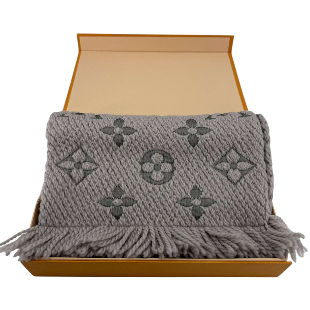 Louis Vuitton Monogram Shine Scarf Grey Wool Silk | LuxLoveLouis displayed in a gift box, featuring iconic LV pattern.