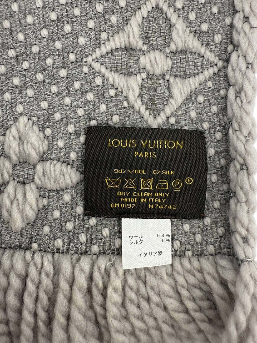 Louis Vuitton Monogram Shine Scarf Grey Wool Silk | LuxLoveLouis label showcasing composition and care instructions.