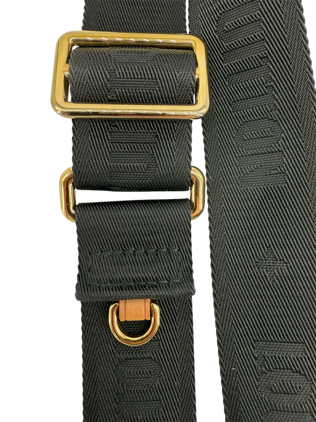 Close-up of Louis Vuitton Bandoulière Bag Strap with gold buckle and dark canvas detailing.