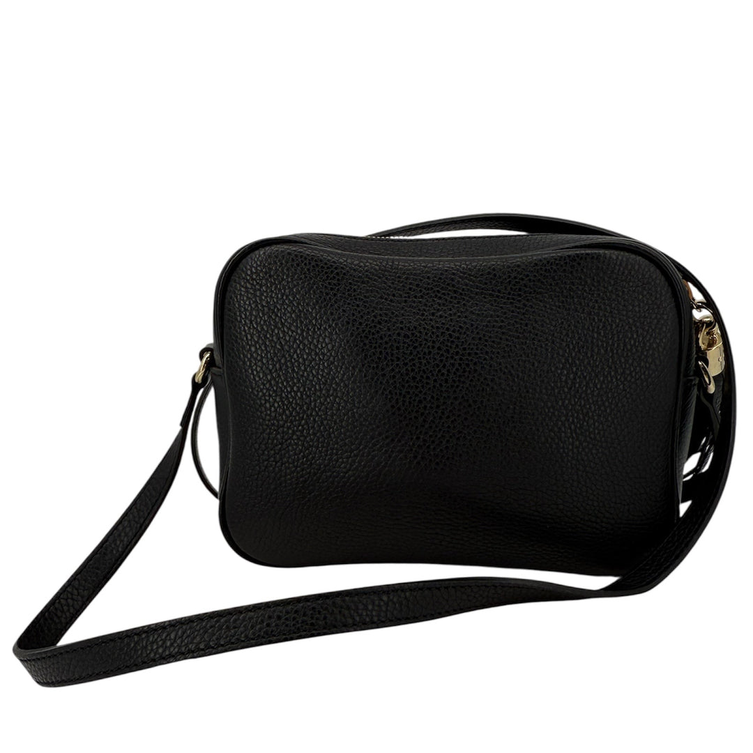 Gucci Soho Disco Small Crossbody bag in black pebbled calfskin with tassel, adjustable strap, stylish and functional.