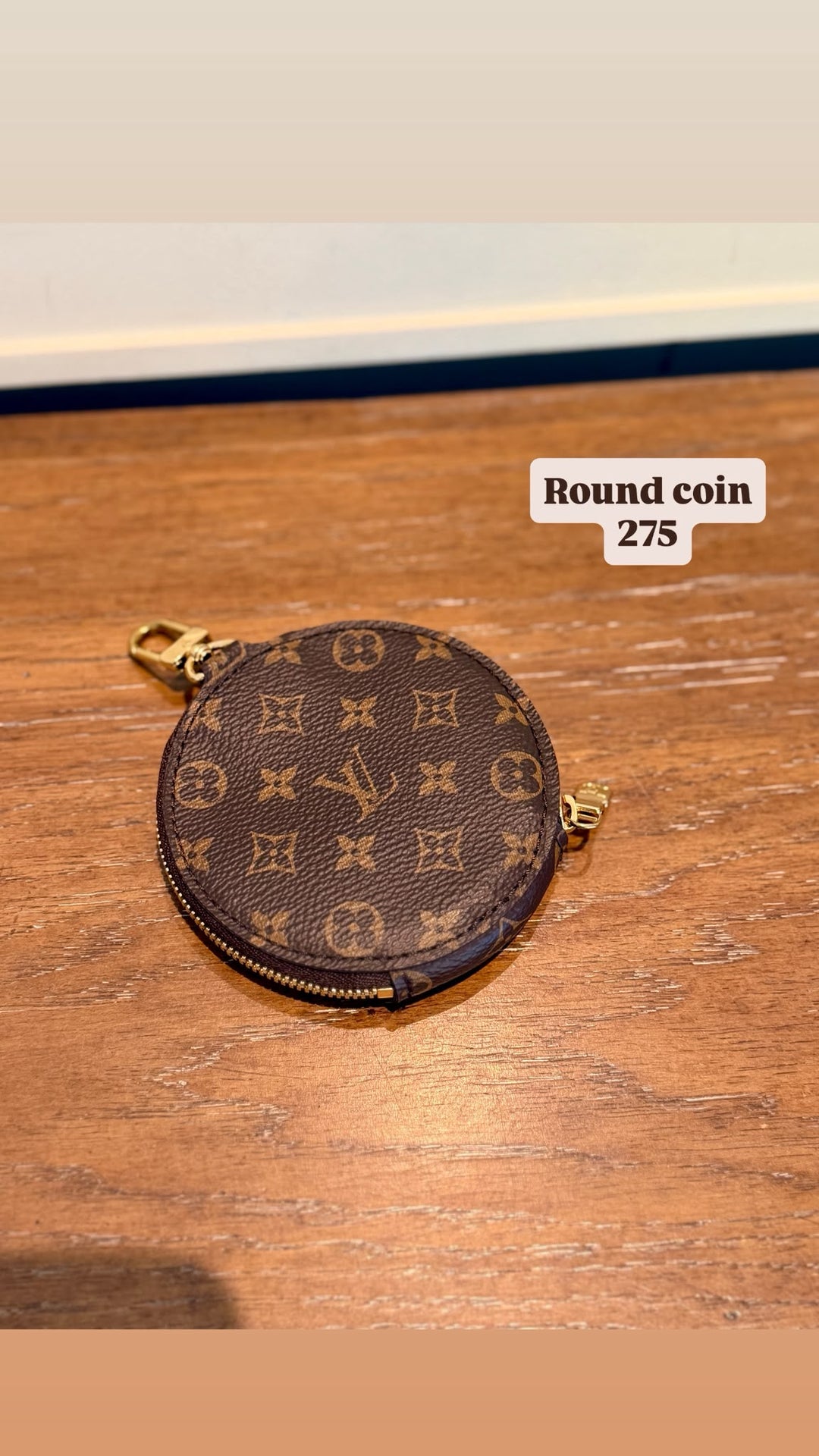 LV round coin