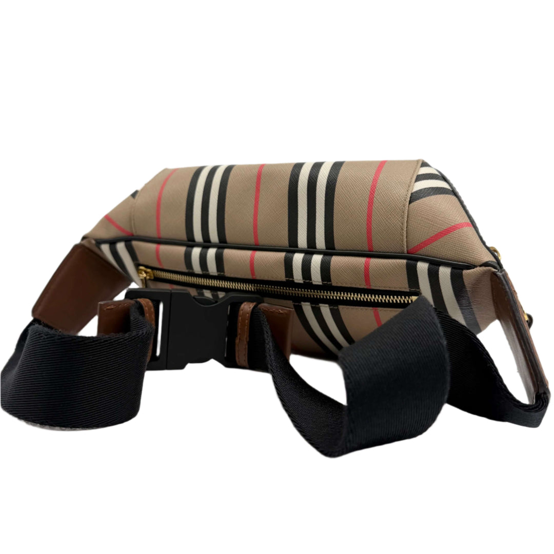 Burberry Icon Stripe Sonny Bum Bag in E-Canvas featuring Archive Check and gold hardware, angled view.