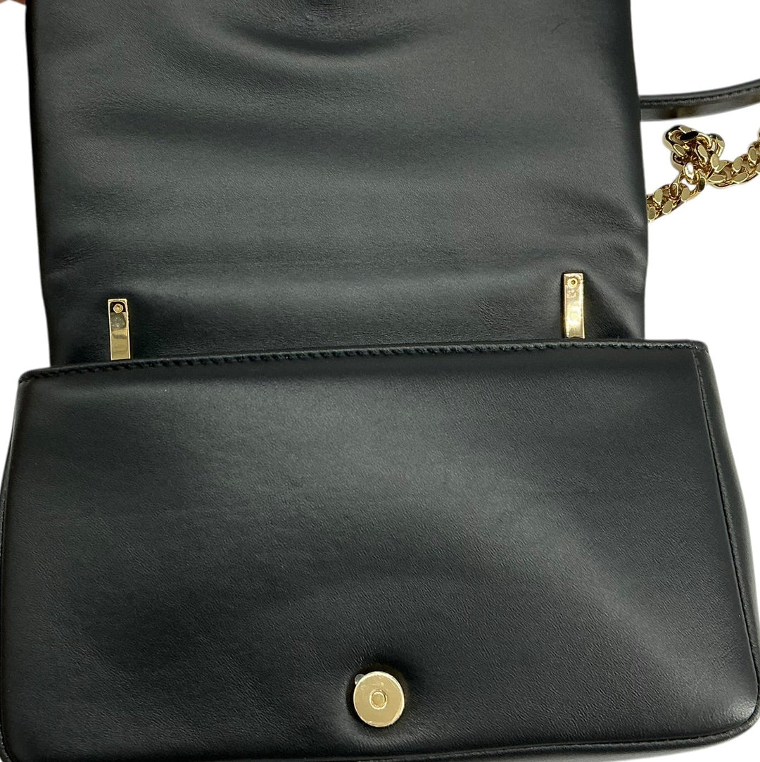 Burberry Mini Lola black leather flap interior and magnetic closure