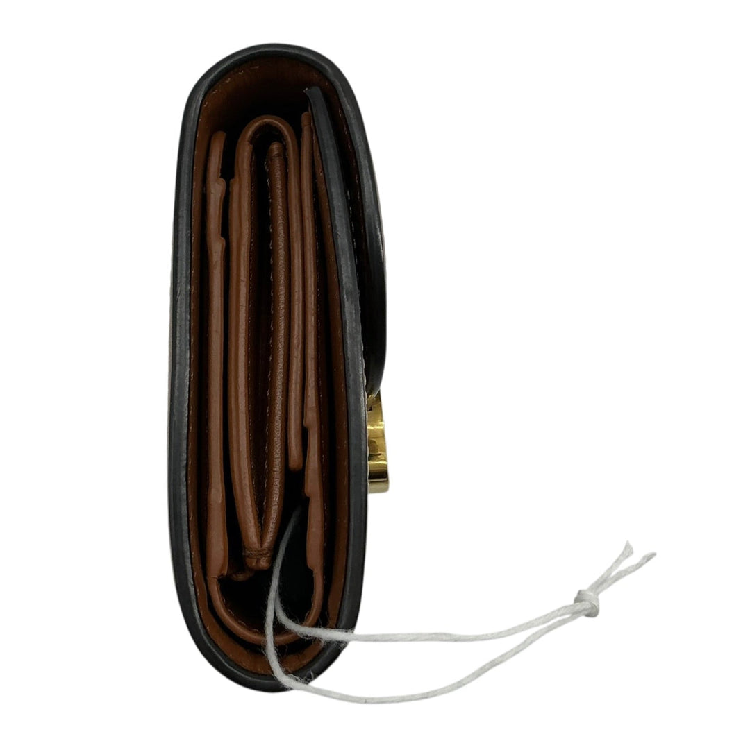 Celine Textile Triomphe Compact Wallet folded side profile