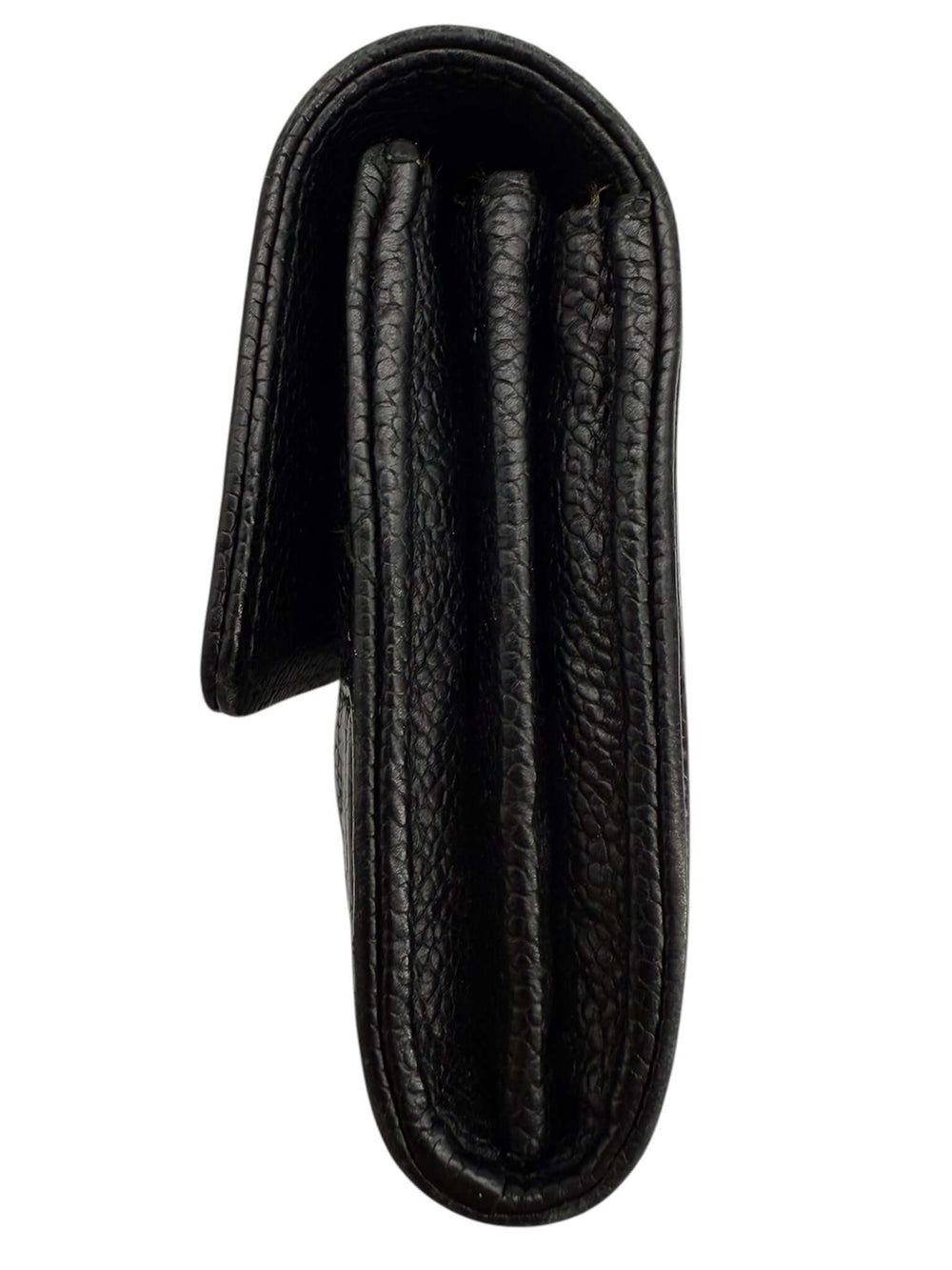 Chanel Caviar Quilted Large Boy Wallet in black, showcasing its elegant folded design and luxurious texture.