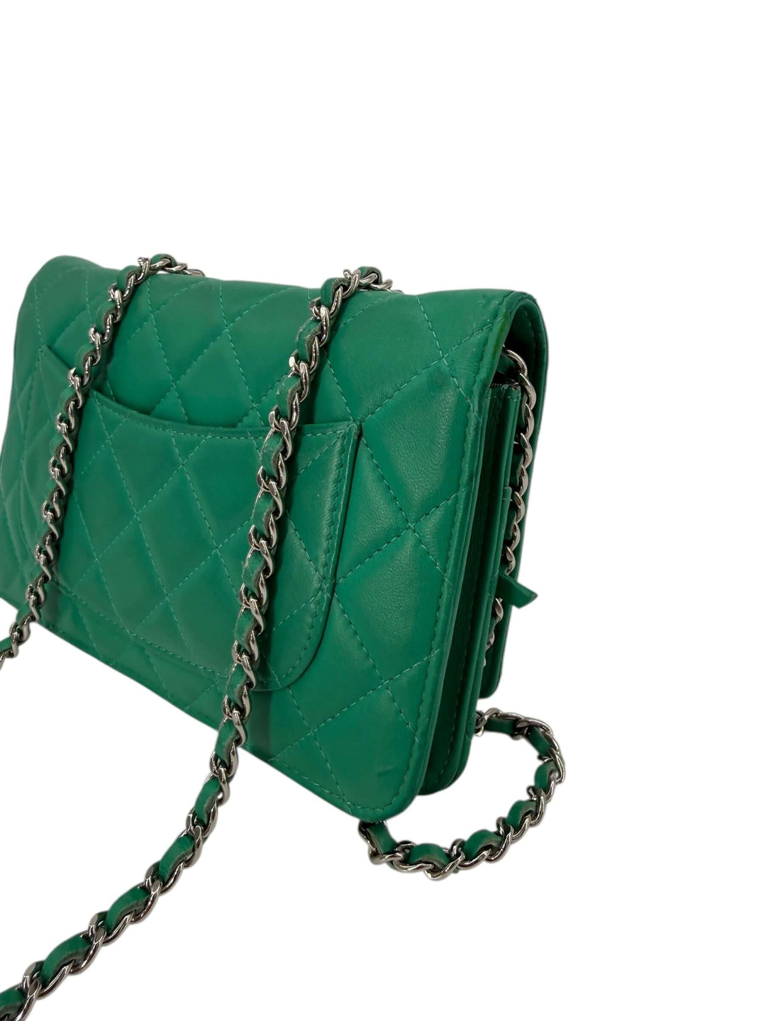 Chanel Green Quilted Leather Wallet on Chain with Silver Hardware side view showing chain strap and pocket design.