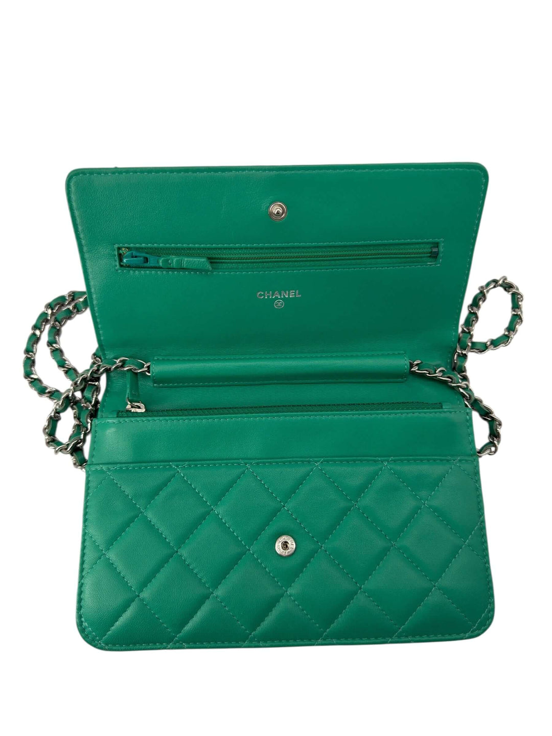 Chanel Green Quilted Leather Wallet on Chain with Silver Hardware interior view showcasing compartments and chain strap.