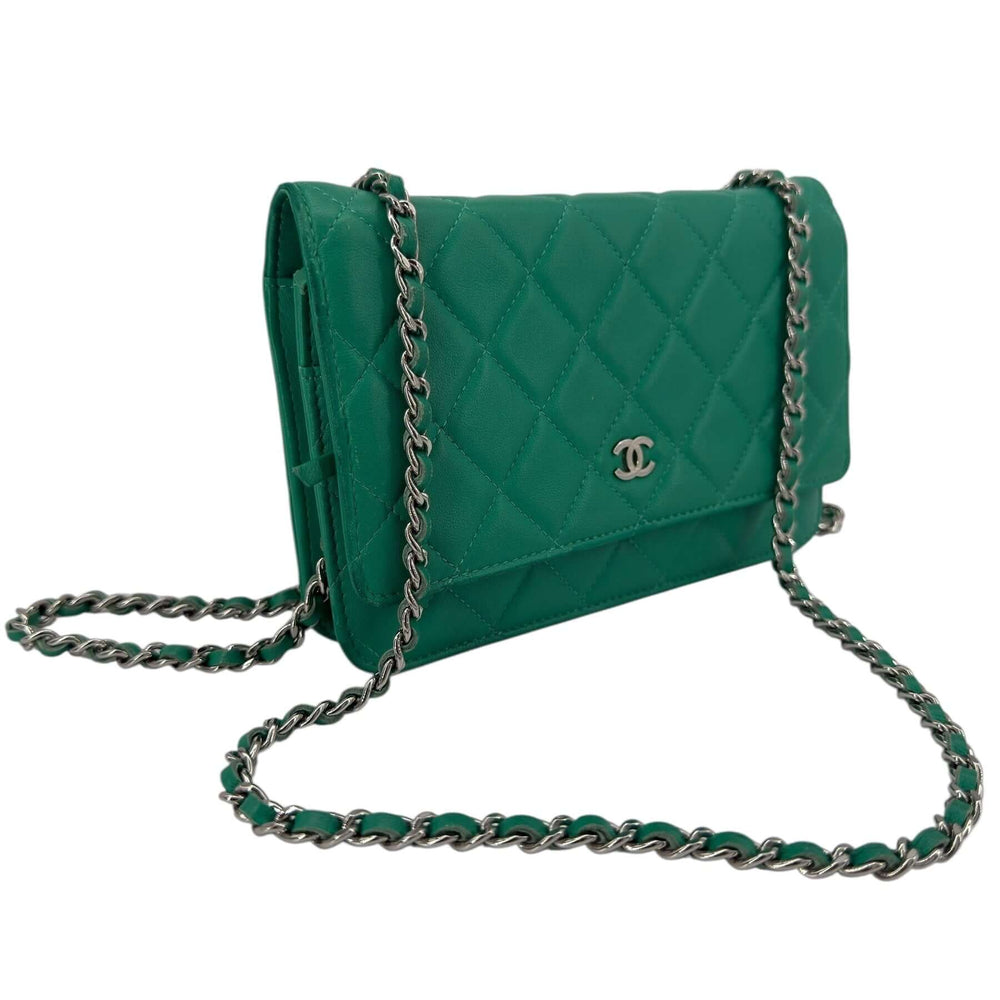 Chanel Green Quilted Leather Wallet on Chain with Silver Hardware, showcasing its stylish design and elegant chain strap.