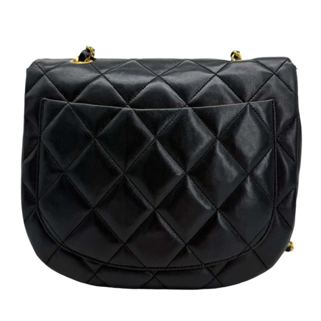 Chanel Lambskin Quilted Small Single Flap Bag in black leather with diamond pattern and gold chain detail.