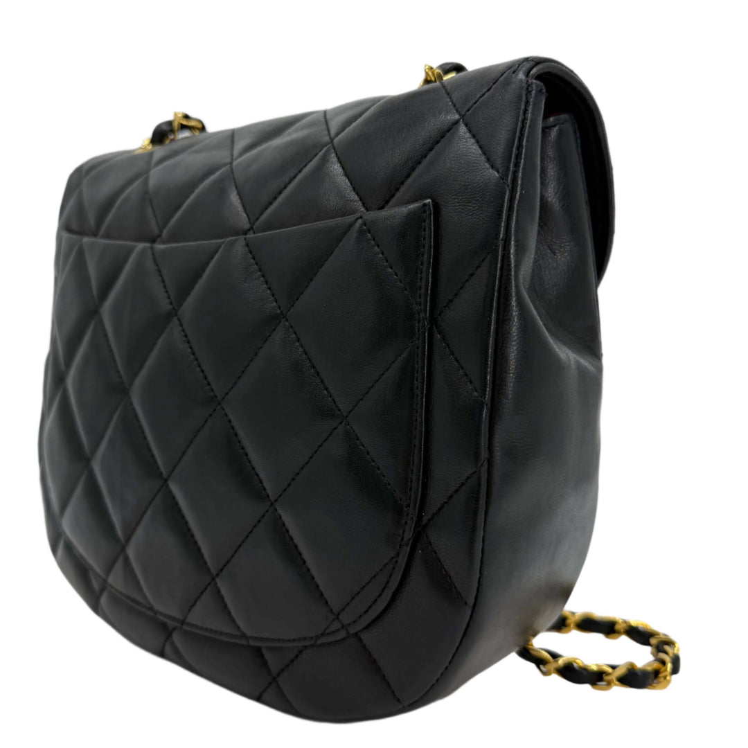 Chanel Lambskin Quilted Small Single Flap Bag in black with diamond pattern and gold chain detailing.
