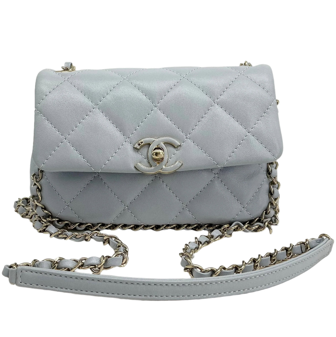 Chanel Mini Chain Around Flap Bag in quilted calfskin leather, featuring a signature chain strap and twist-lock closure.