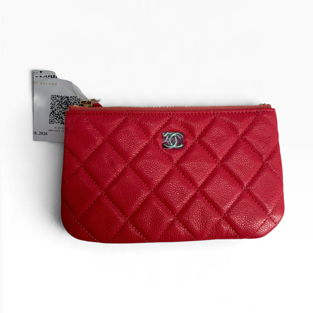 Close front view of CHANEL Classic Mini O-Case in red diamond quilted leather