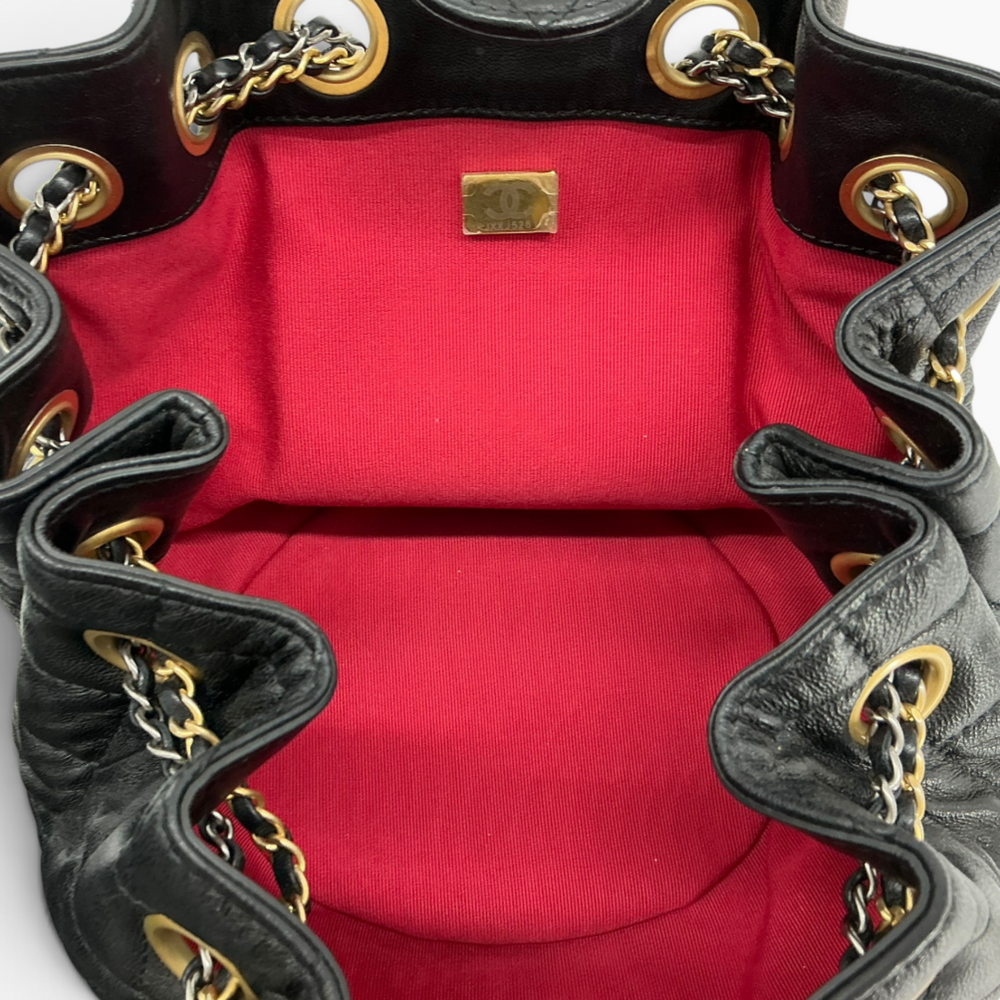 Chanel Small 19 Bucket Bag interior showing contrasting red grosgrain lining and interior organization