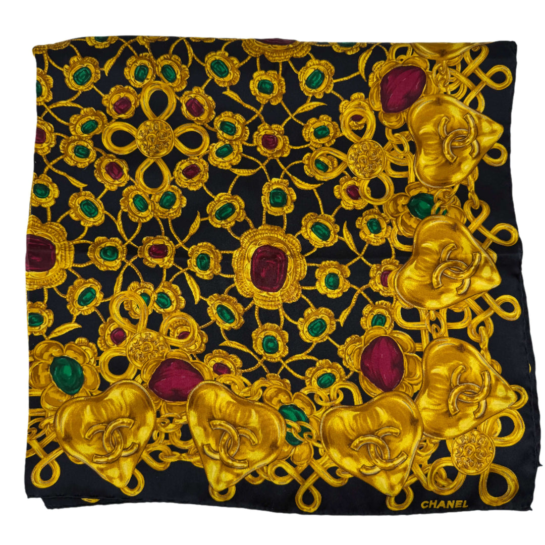 CHANEL Vintage Jewelry Chain Silk Scarf in black and gold, featuring ornate jewelry motifs and vibrant colors.