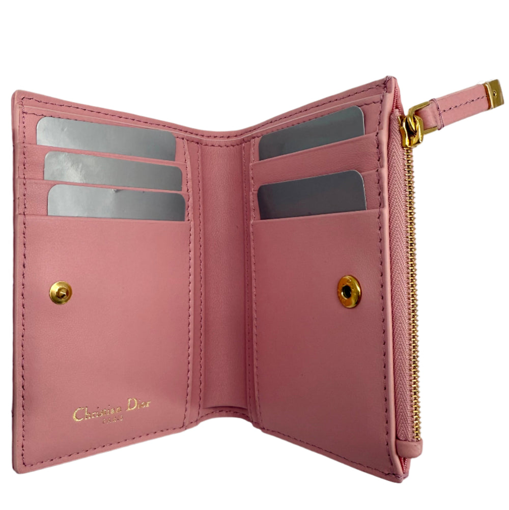 Interior view of Christian Dior Cannage Caro Slim Wallet in Glycine pink leather with card slots and gold hardware.