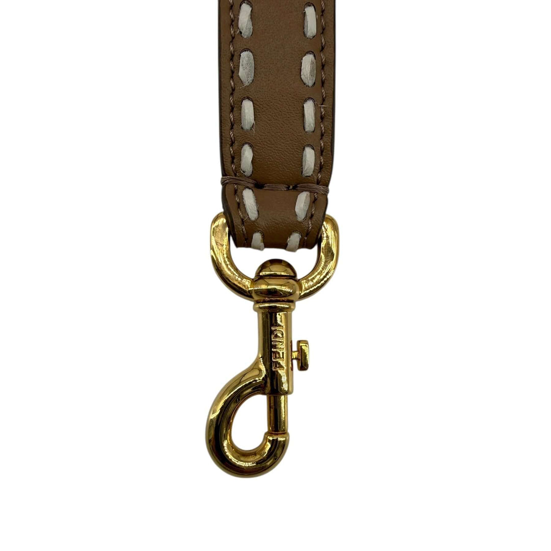 Fendi Shearling & Leather Checkered Bag Strap gold clip detail showcasing luxury craftsmanship and high-quality materials.