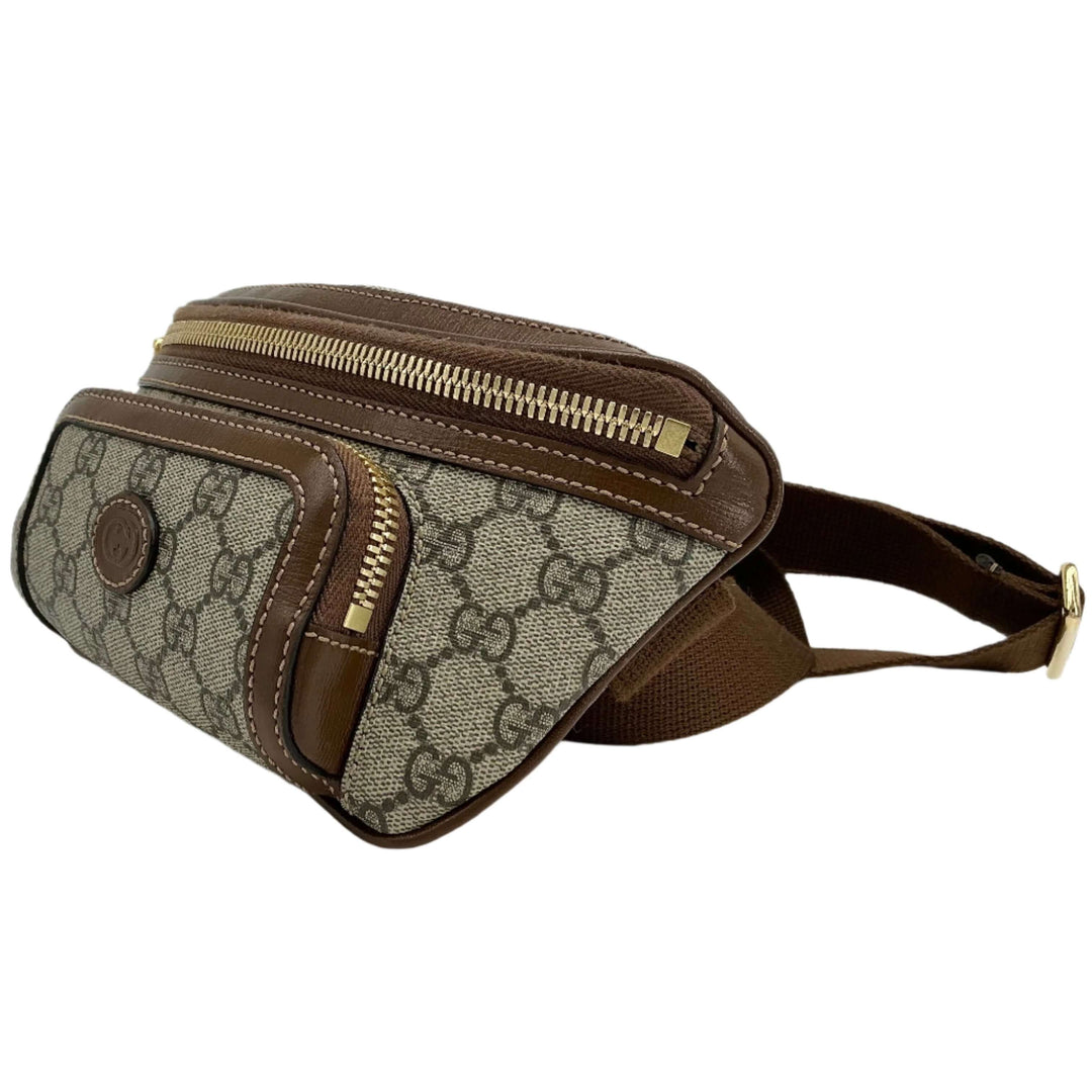 Gucci GG Supreme Monogram Retro Interlocking G Belt Bag in beige and brown, showcasing its stylish design and functional zippers.