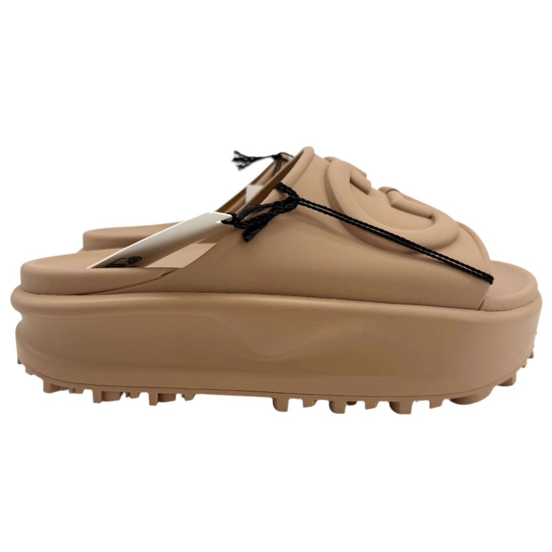Gucci Interlocking G Platform Slide Sandals in Vintage Camel, soft rubber, with molded sole and minimalist design.