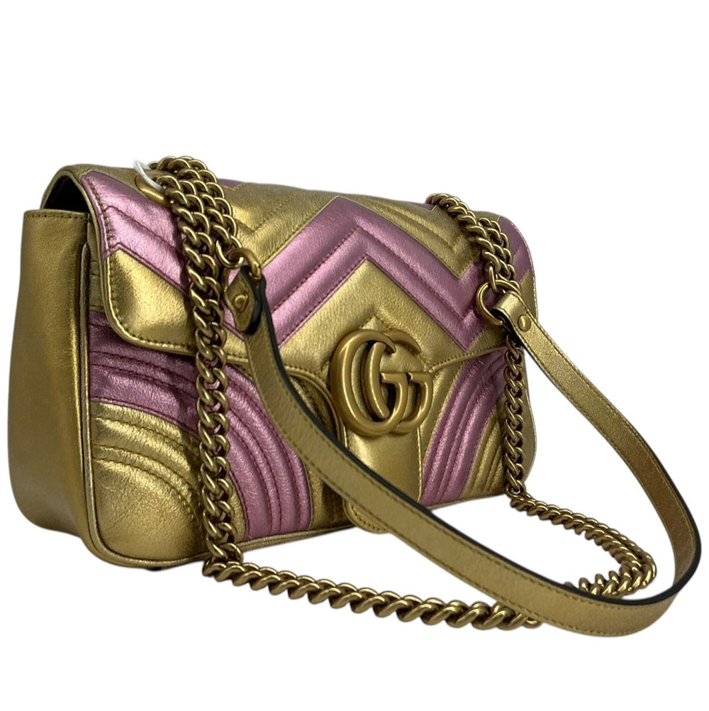 Angled front view of Gucci Mini GG Marmont metallic calfskin bag