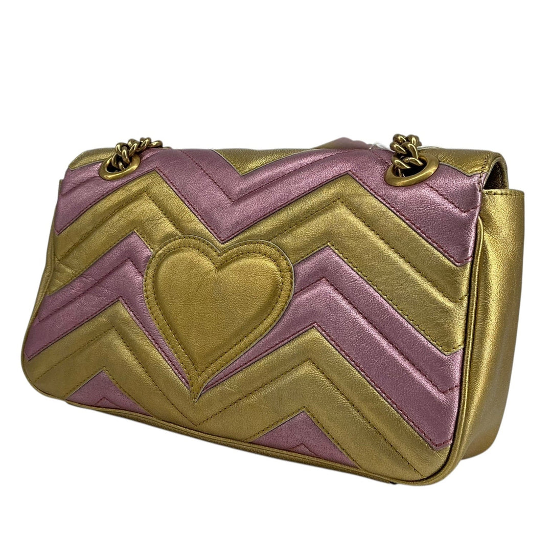 Rear view of Gucci Mini GG Marmont with pink chevron quilting and heart motif