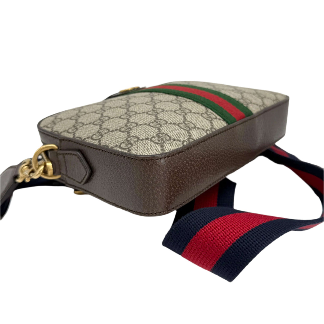 Gucci Ophidia Crossbody Bag in GG Supreme Canvas with Web Strap and Double G Hardware.