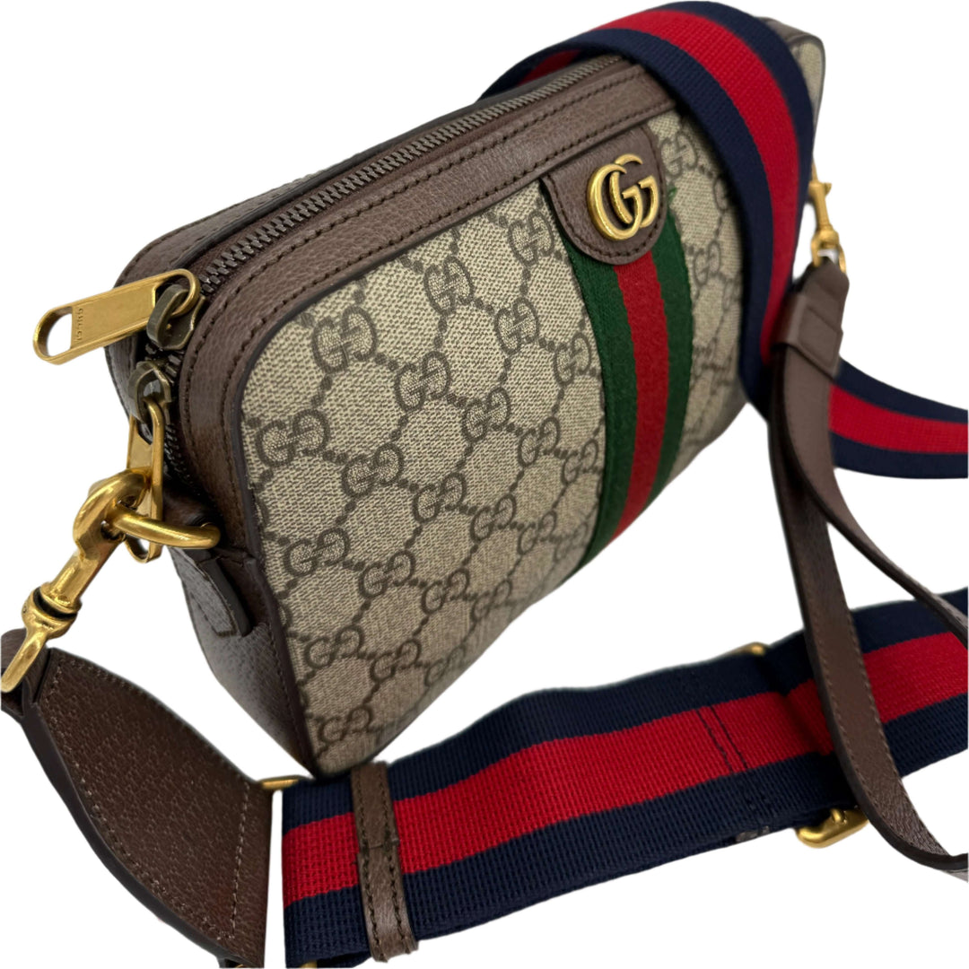 Gucci Ophidia Crossbody Bag in GG Supreme Canvas with Web Strap and Double G Hardware, showcasing classic beige and dark brown design.