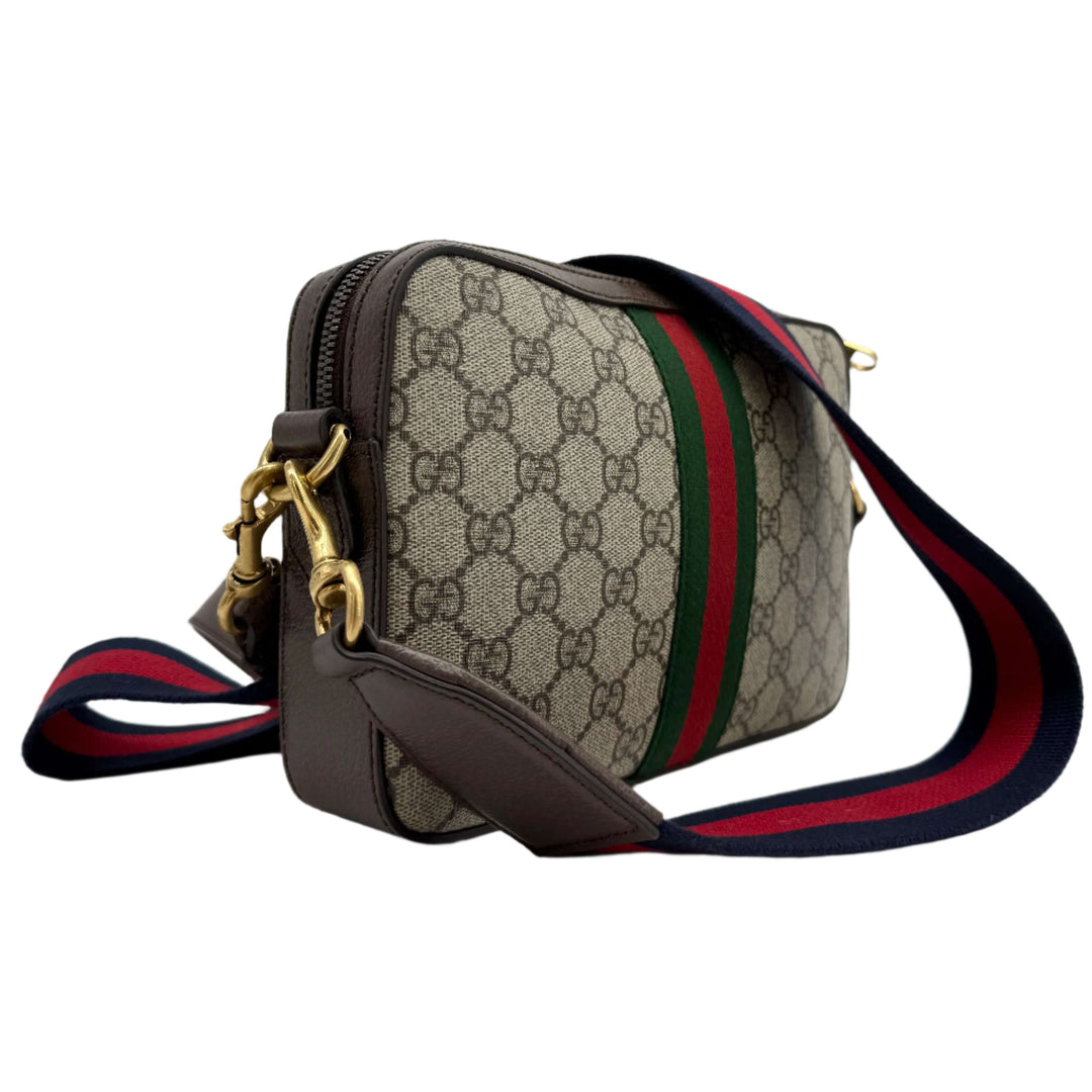 Gucci Ophidia Crossbody Bag showcasing GG Supreme canvas, Web strap, and gold hardware for a stylish look.