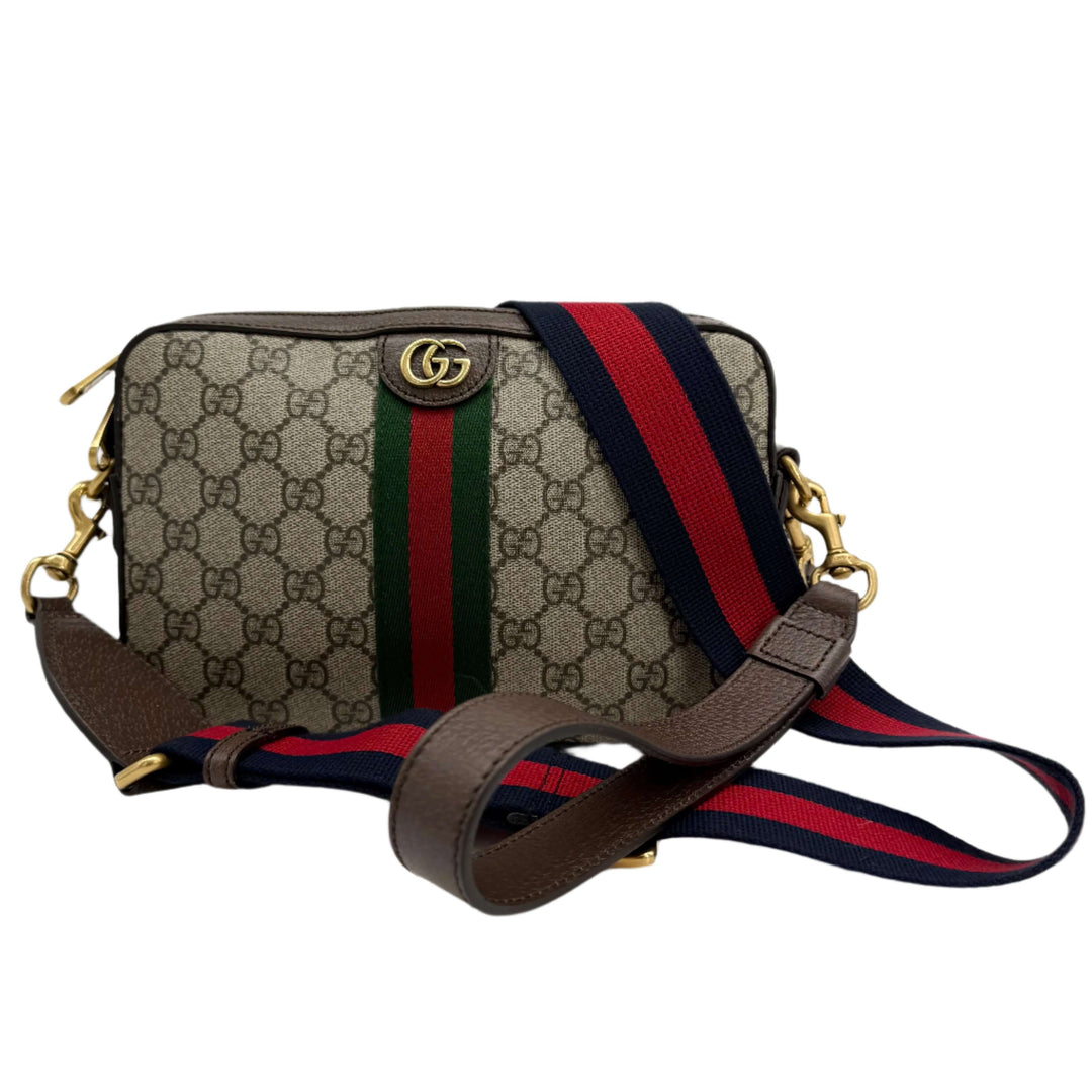 Gucci Ophidia Crossbody Bag in GG Supreme Canvas with Web Strap and Double G Hardware, showcasing beige and dark brown design.