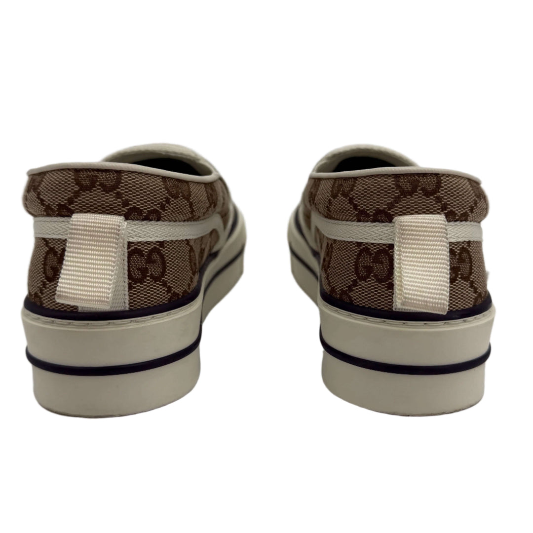 Back view of Gucci Women's Tennis 1977 Slip-On Sneakers featuring iconic GG monogram design and durable canvas material.