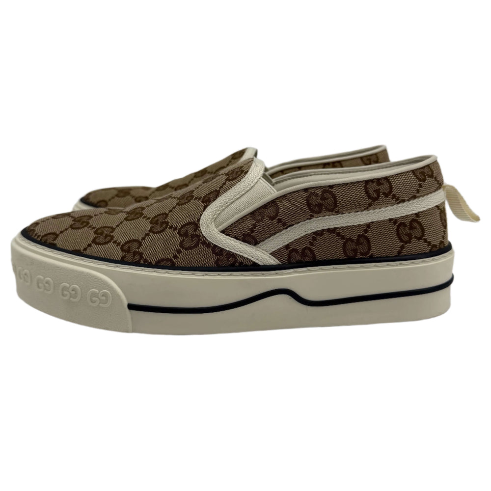 Gucci Women's Tennis 1977 Slip-On Sneakers featuring iconic GG monogram, stylish and luxury heritage, crafted in Italy.