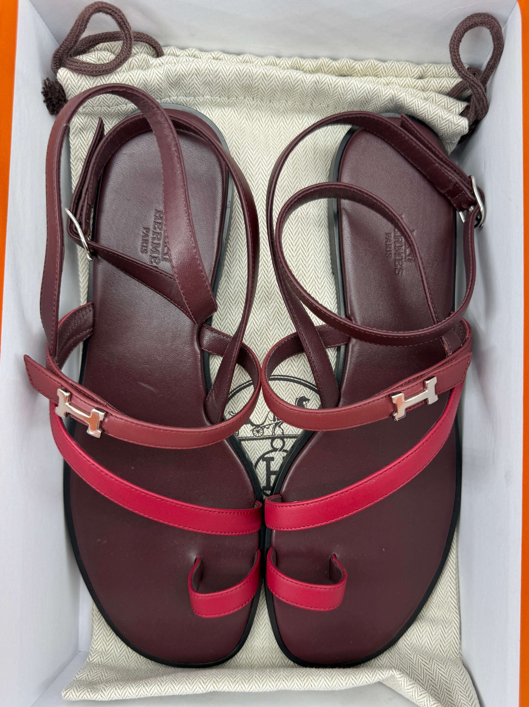 Hermès Leather Slide Sandals in Burgundy – Size 41 displayed in a box, featuring elegant design and high-quality leather.